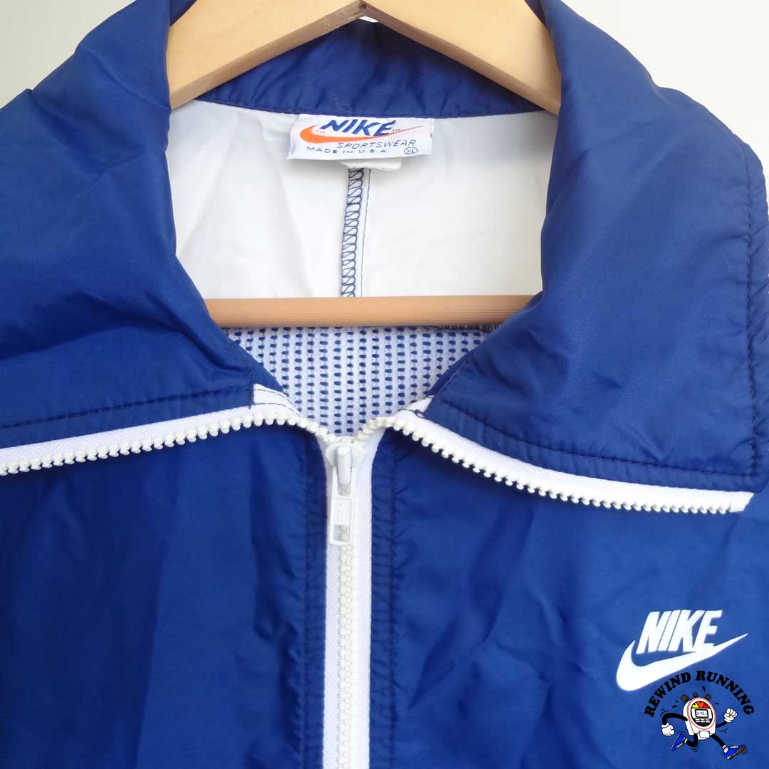 Nike Sportswear Vintage Navy Blue White 70s 80s Windbreaker Track Jacket Anorak 'Orange Tag' Label and Nike Swoosh Logo Detail