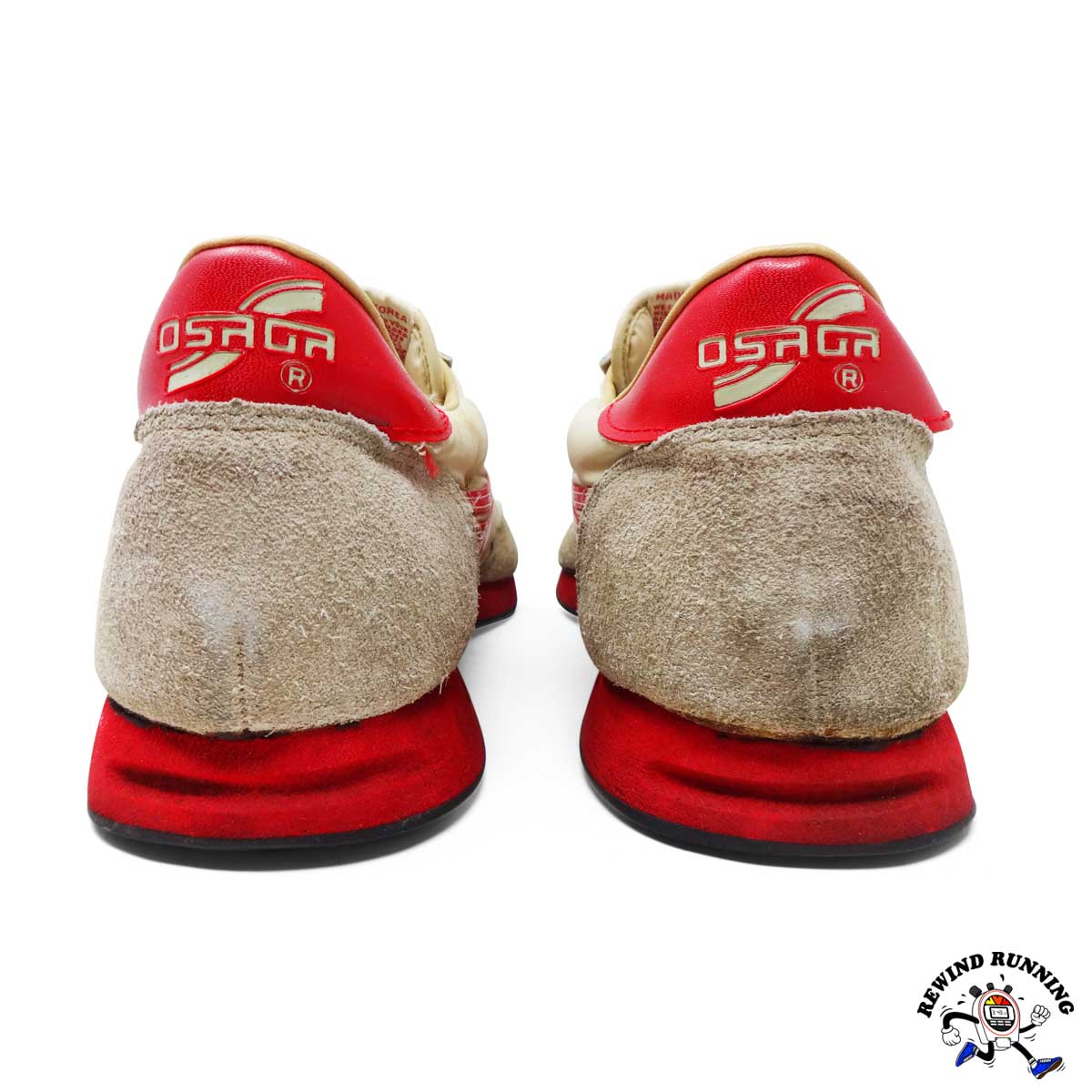 Red and beige Osaga vintage running shoes on a white background
