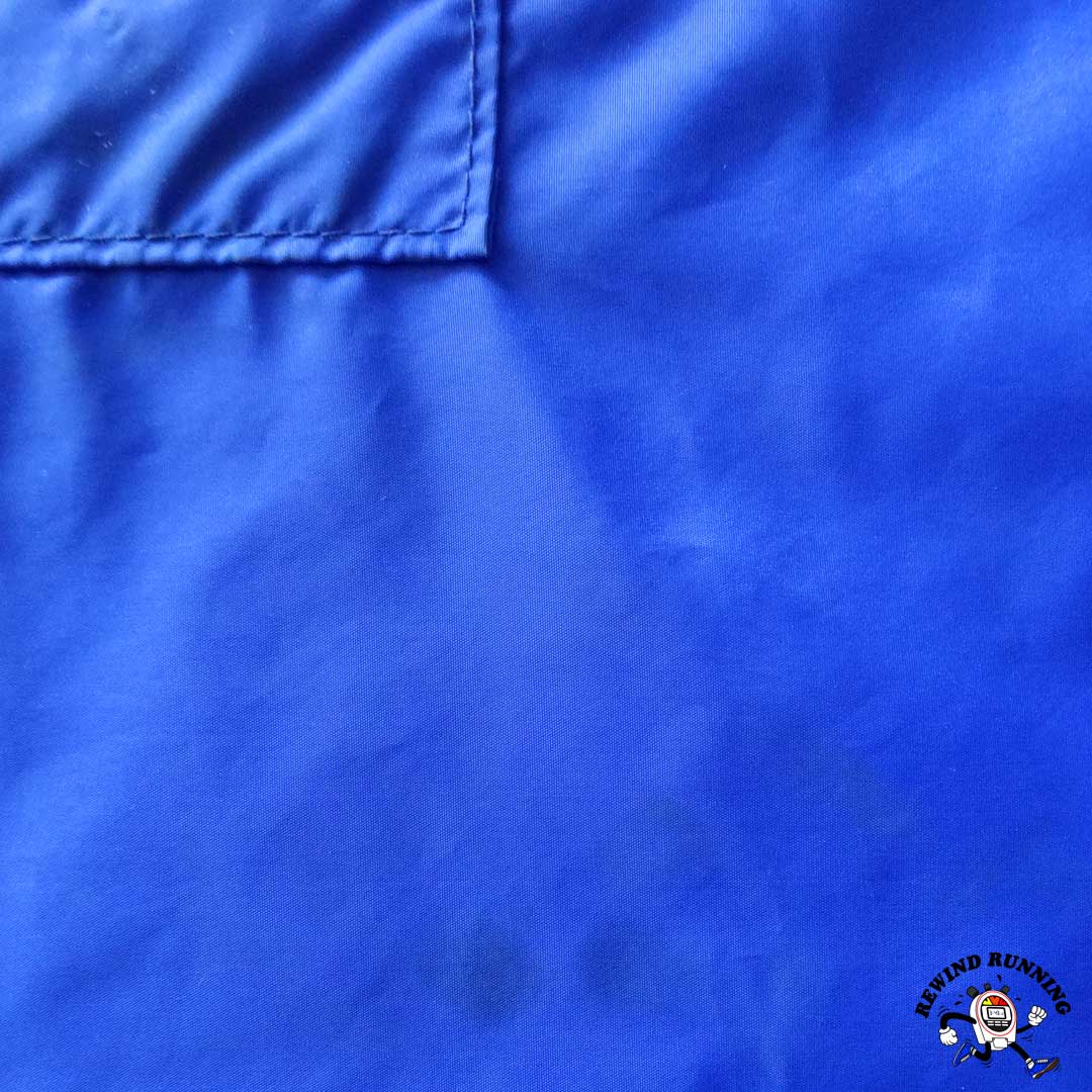 Nike Vintage Men's 70s 80s Blue Yellow Windbreaker Pocket Front Detail