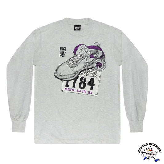 Gray long-sleeve shirt with a graphic of a Nike swoosh LDV vintage running shoe and text on a white background