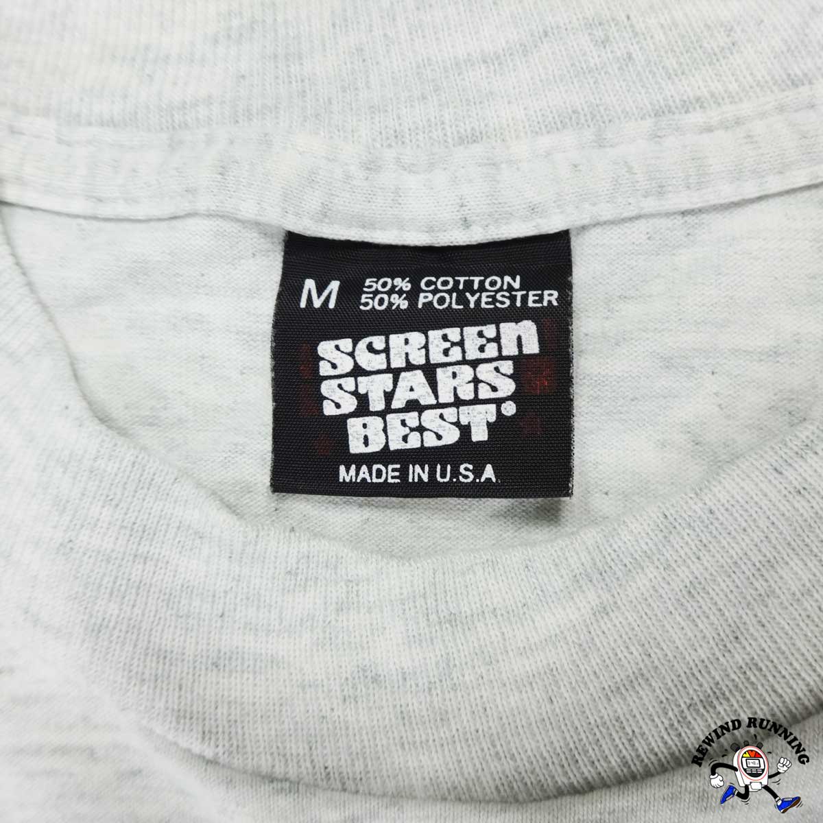 Gray sweatshirt with a label reading 'Screen Stars Best' and 'Made in U.S.A.'