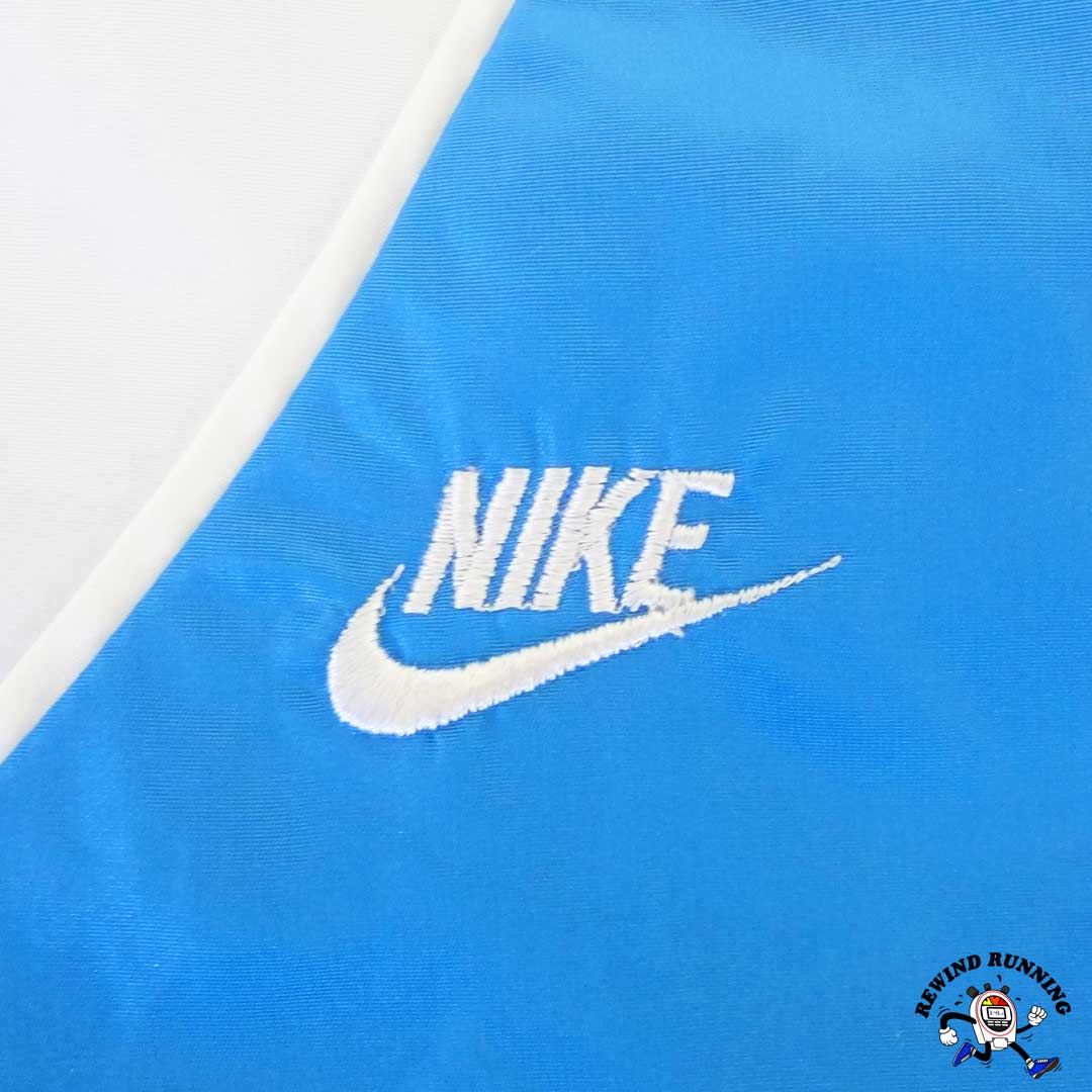 Vintage Nike Running Windbreaker 80s embroidered swoosh logo