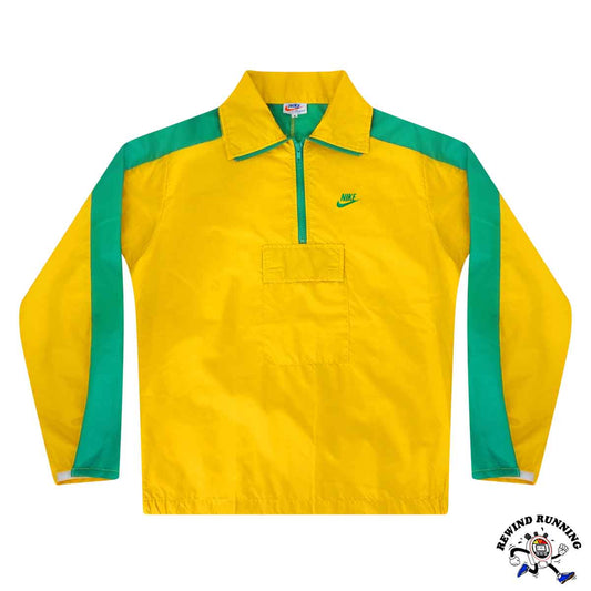Yellow and green jacket with Nike logo on a white background