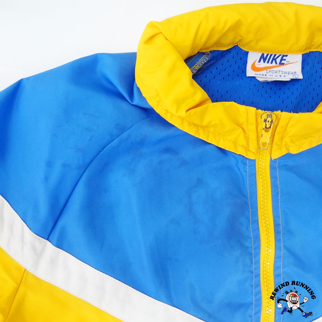 blue windbreaker jacket